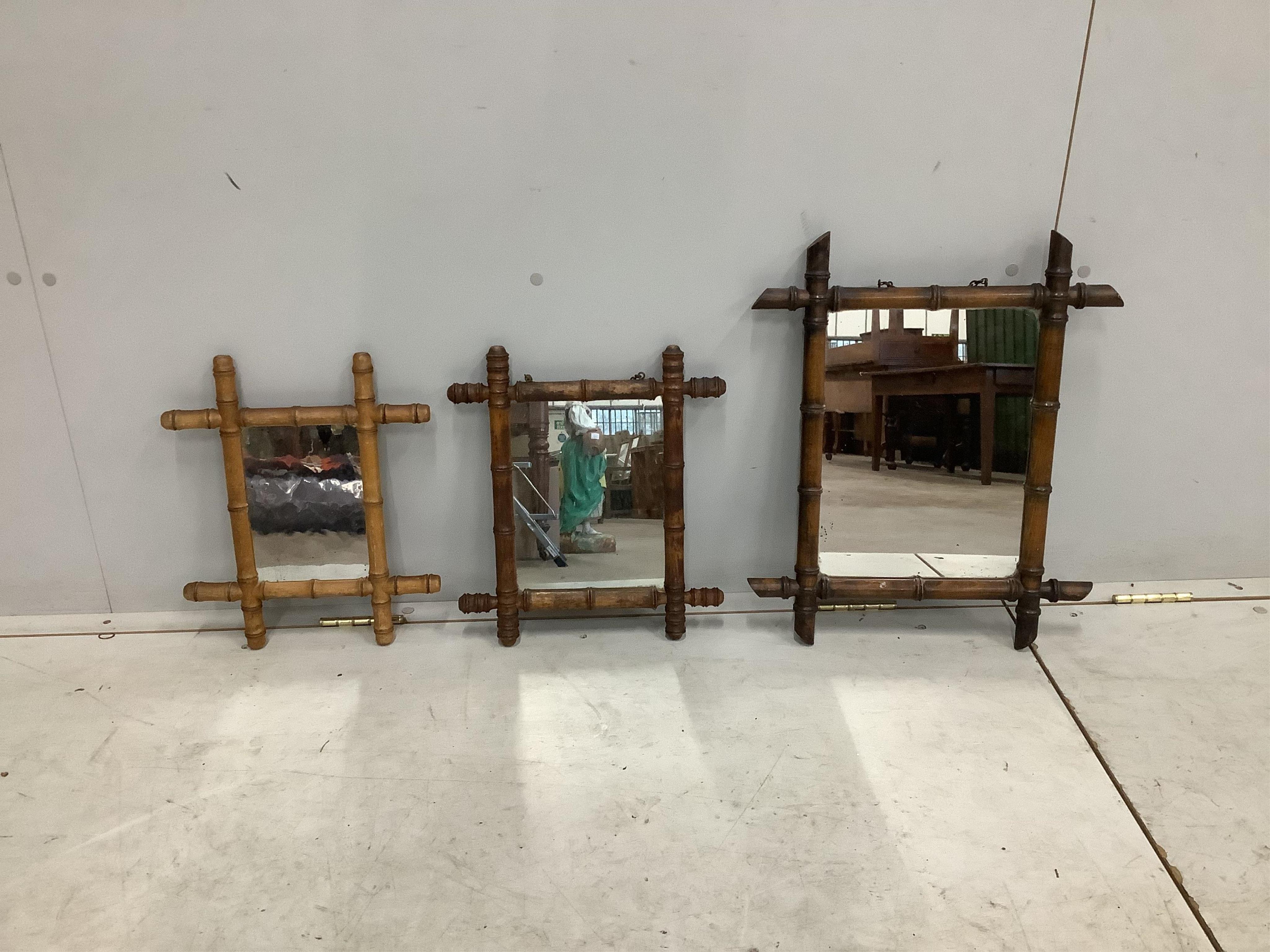 Three early 20th century French rectangular faux bamboo wall mirrors, largest width 42cm, height 53cm. Condition - fair